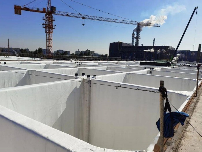 Rigid landfill concrete cell composite liner